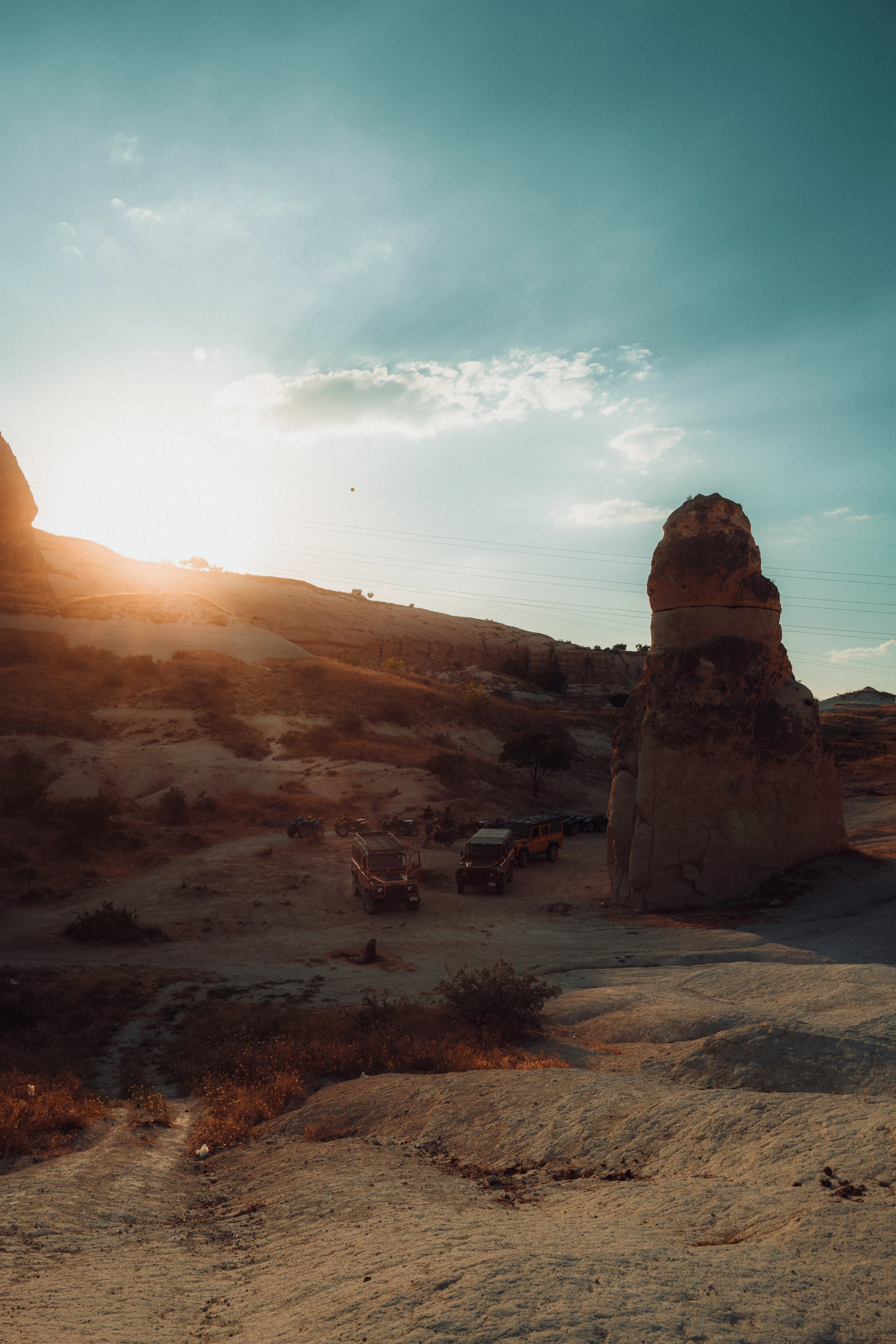 Sunburst behind a Cappadocia rock formation.